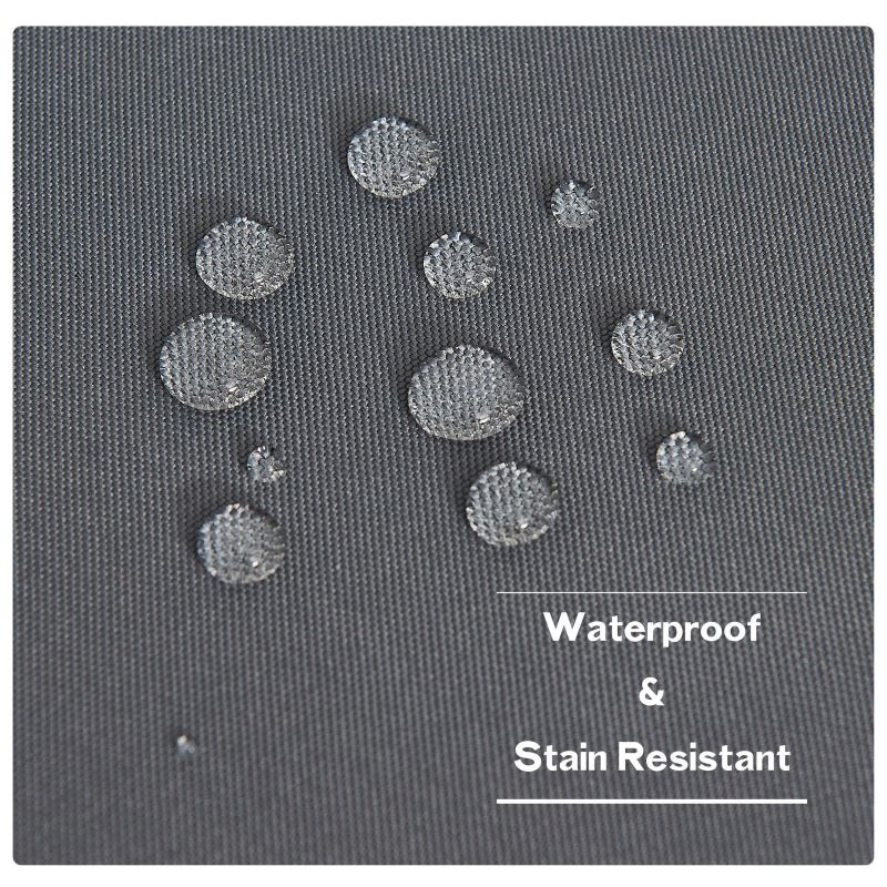 Close-up of gray waterproof outdoor canvas patio curtain fabric with water droplets showing its water and stain resistance.