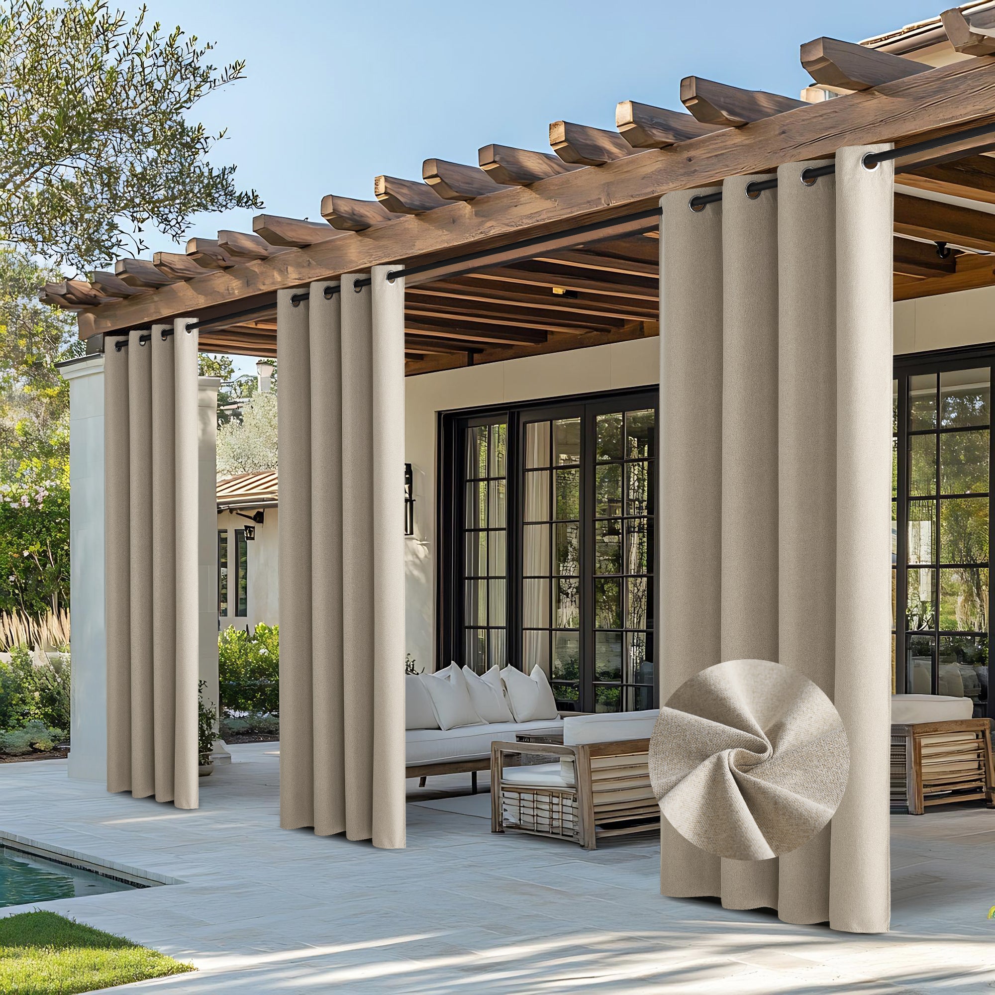 Beige faux linen outdoor curtains on a pergola, creating waterproof blackout shade for a patio & pool area. Close-up of fabric.