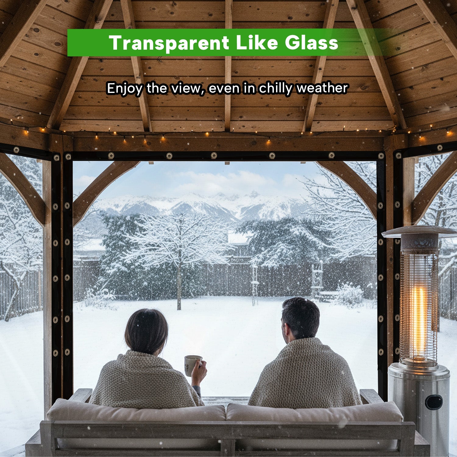 Couple relaxing in a gazebo, viewing snowy mountains through clear 20mil heavy duty PVC insulation outdoor tarps with grommets.