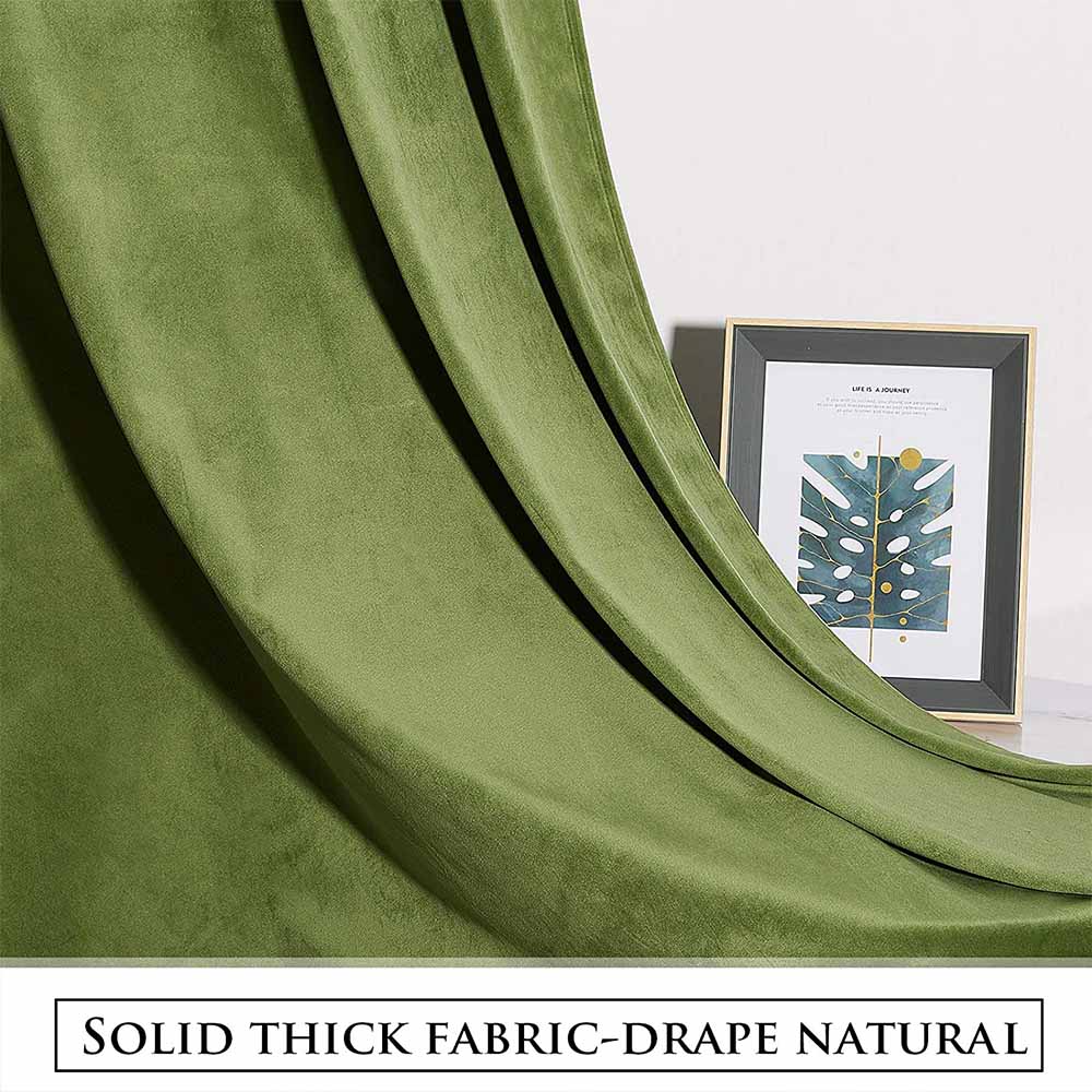 Close-up of elegant green velvet blackout curtain fabric, showcasing its soft texture and luxurious drape for noise reducing living room or bedroom.