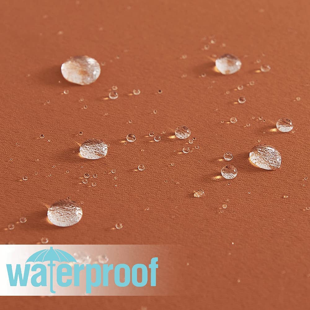 Close-up of water droplets beading on a textured brown waterproof patio outdoor curtain fabric, showcasing its weatherproof protection.