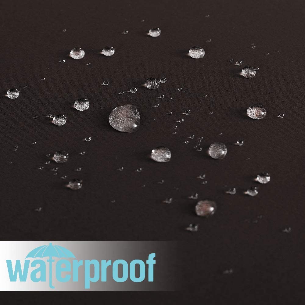 Close-up of a dark, heavy-duty waterproof patio outdoor curtain fabric with water droplets beading, highlighting its weather resistance.