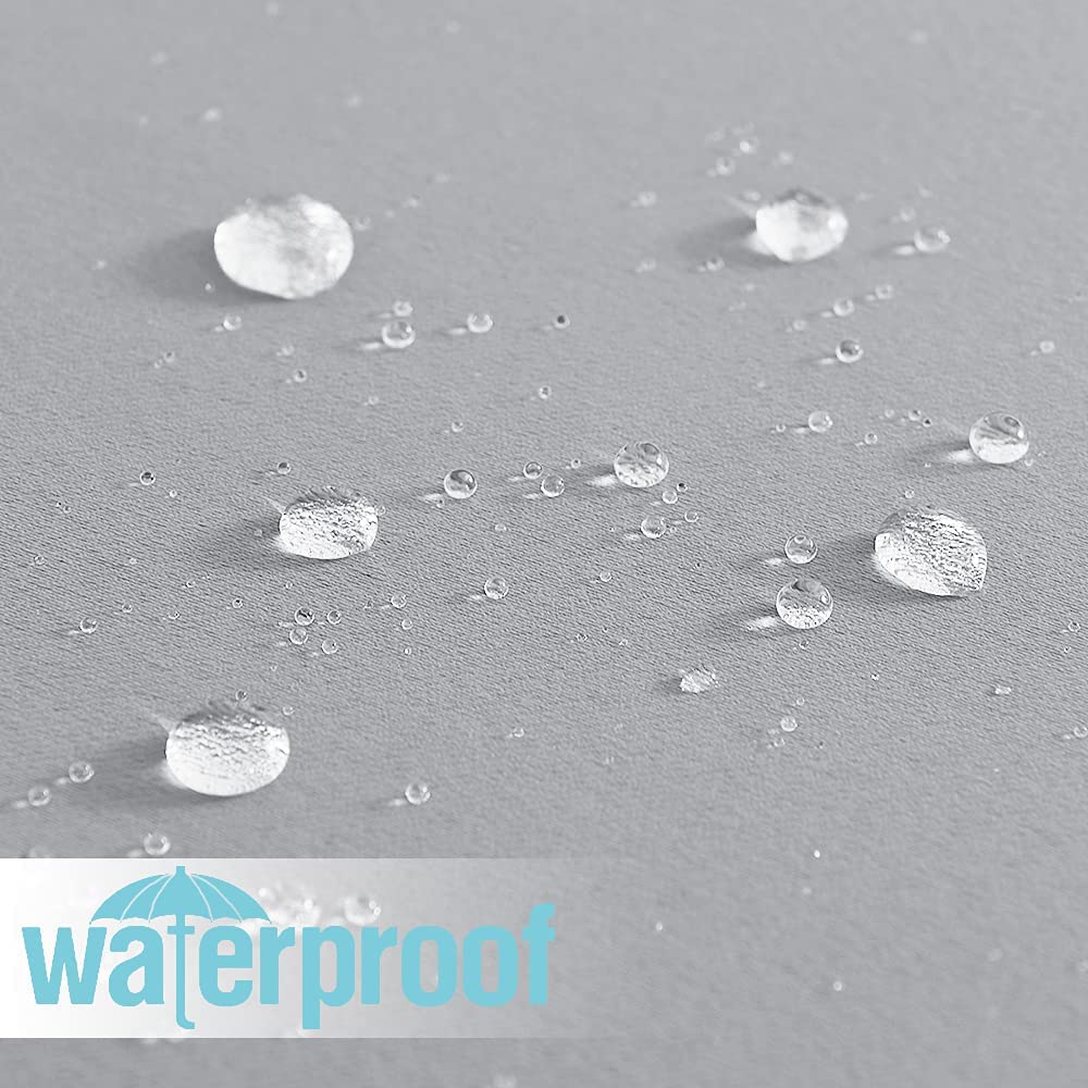 Water droplets beading on a gray waterproof outdoor curtain fabric, highlighting its superior rain and weather protection.