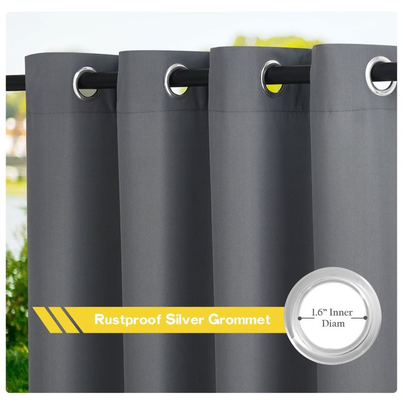 Dark grey waterproof outdoor canvas patio curtain showing rustproof 1.6" silver grommets on a rod.