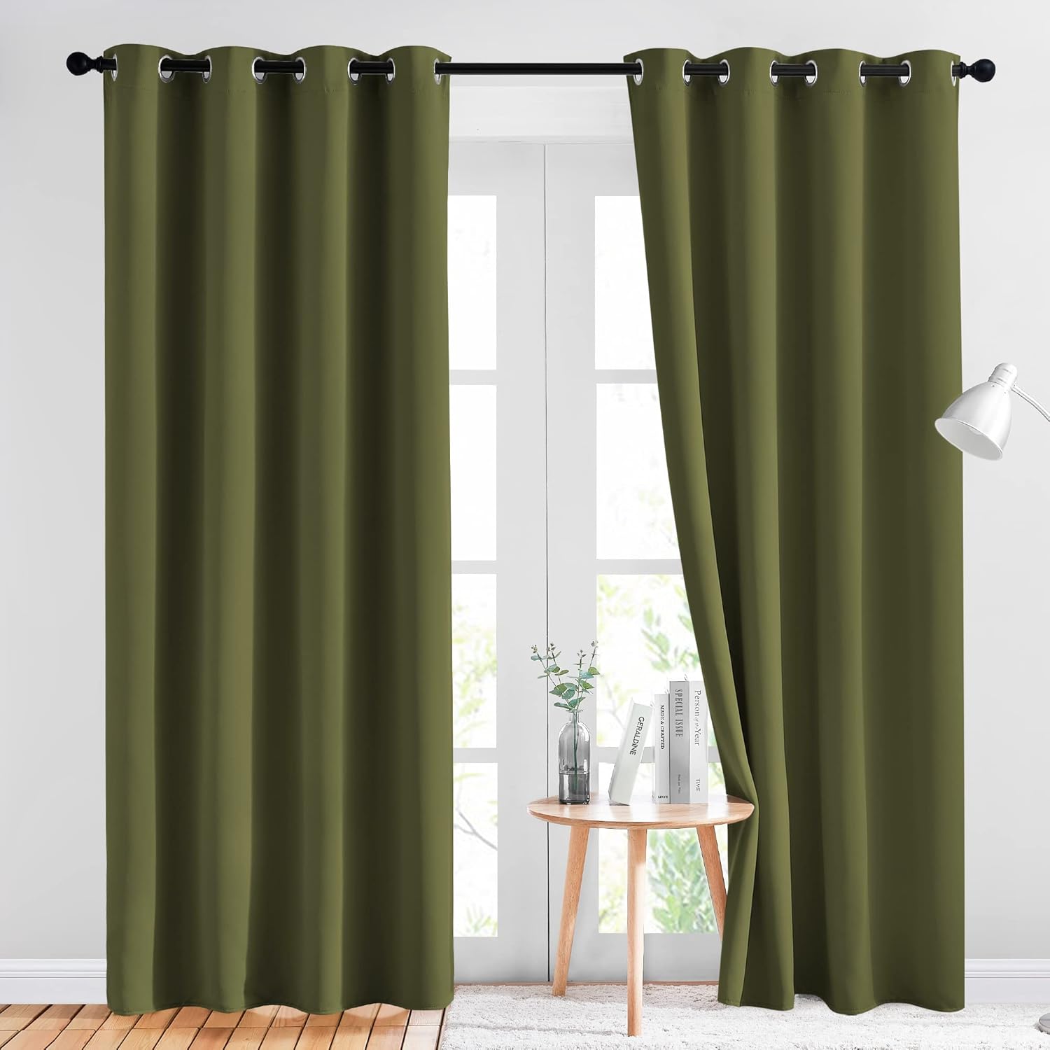 KGORGE olive green blackout grommet curtains on a window. One panel is pulled back, showing privacy and room darkening.