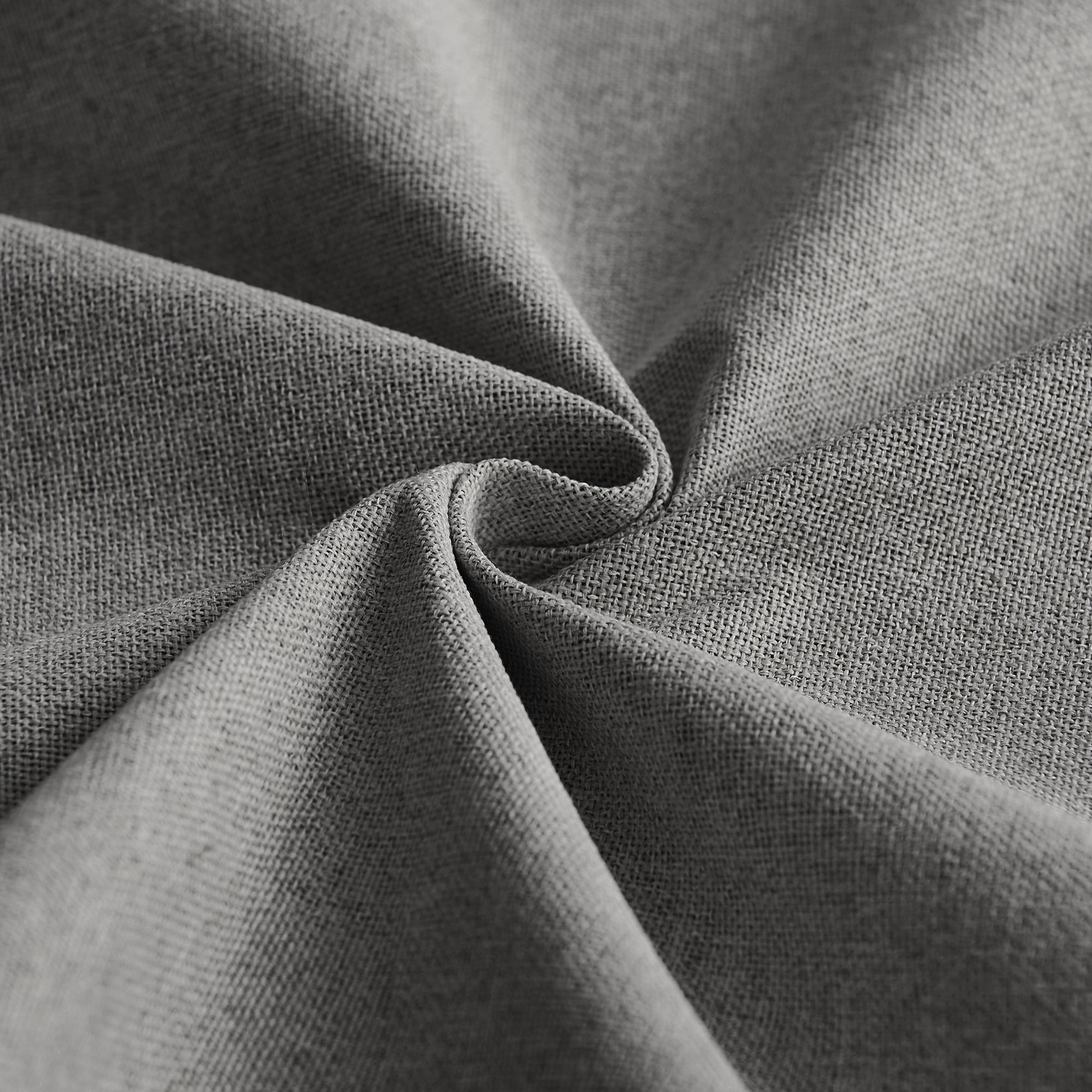 Close-up of dark grey OEKO-TEX faux linen outdoor curtain fabric with visible texture and soft folds, highlighting its blackout and waterproof quality.