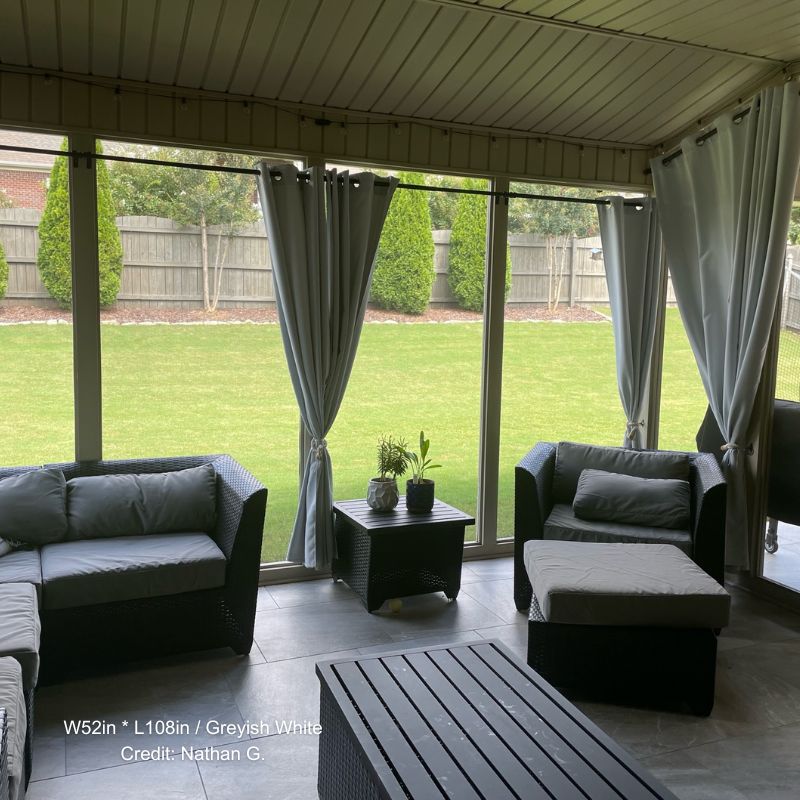 KGORGE Greyish White waterproof grommet top patio outdoor curtains providing shade and privacy to a modern outdoor living space.