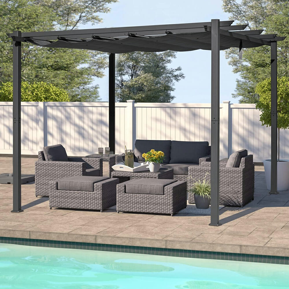 Ret retractable dark gray pergola canopy fabric shades stylish wicker patio furniture by a pool, creating a perfect outdoor living space.