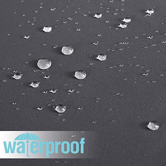 Water beads on the dark grey waterproof outdoor curtain fabric, showcasing its high-performance weatherproof protection for patios.