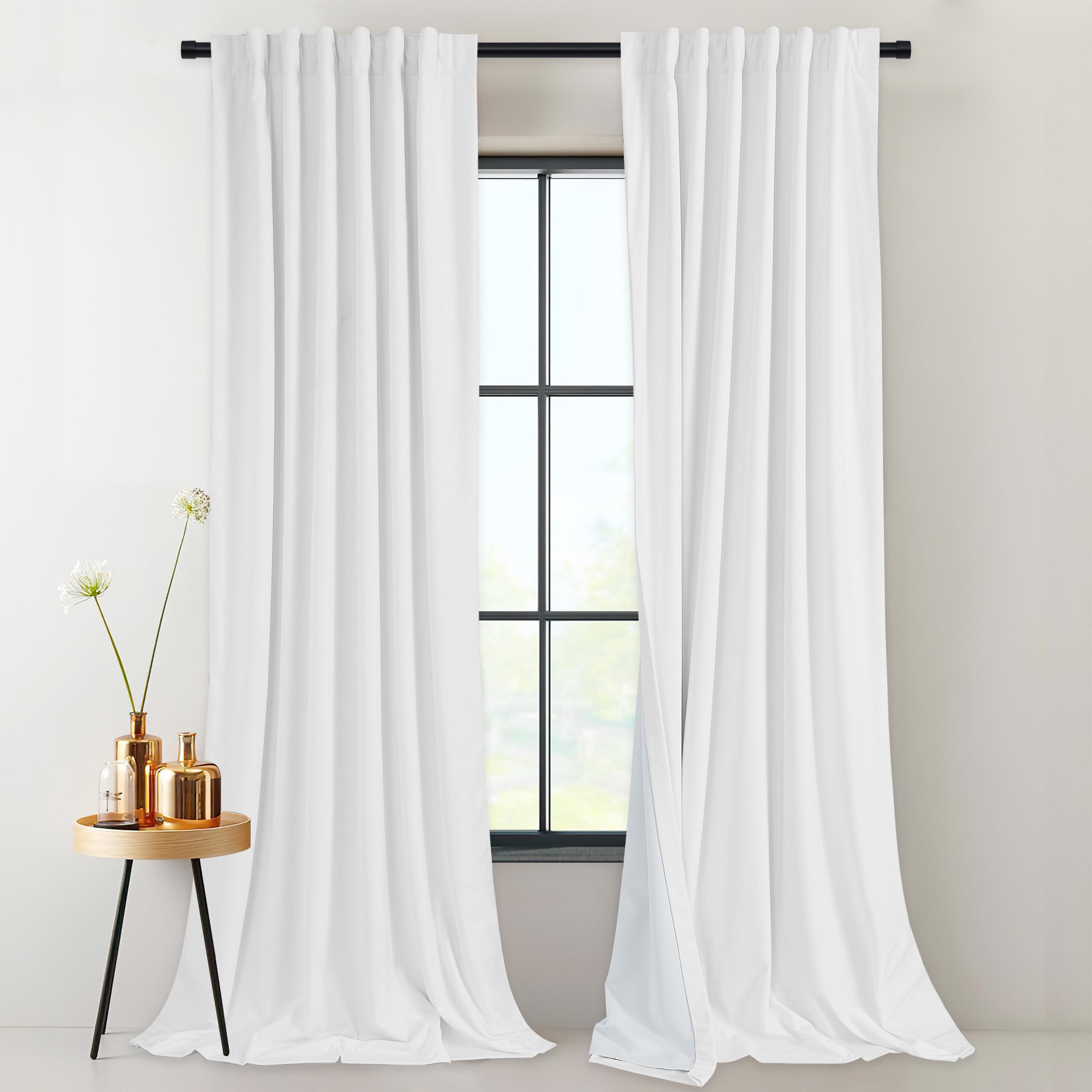 White 2-layer velvet thermal insulated light blocking drapes with rod pocket and back tab.