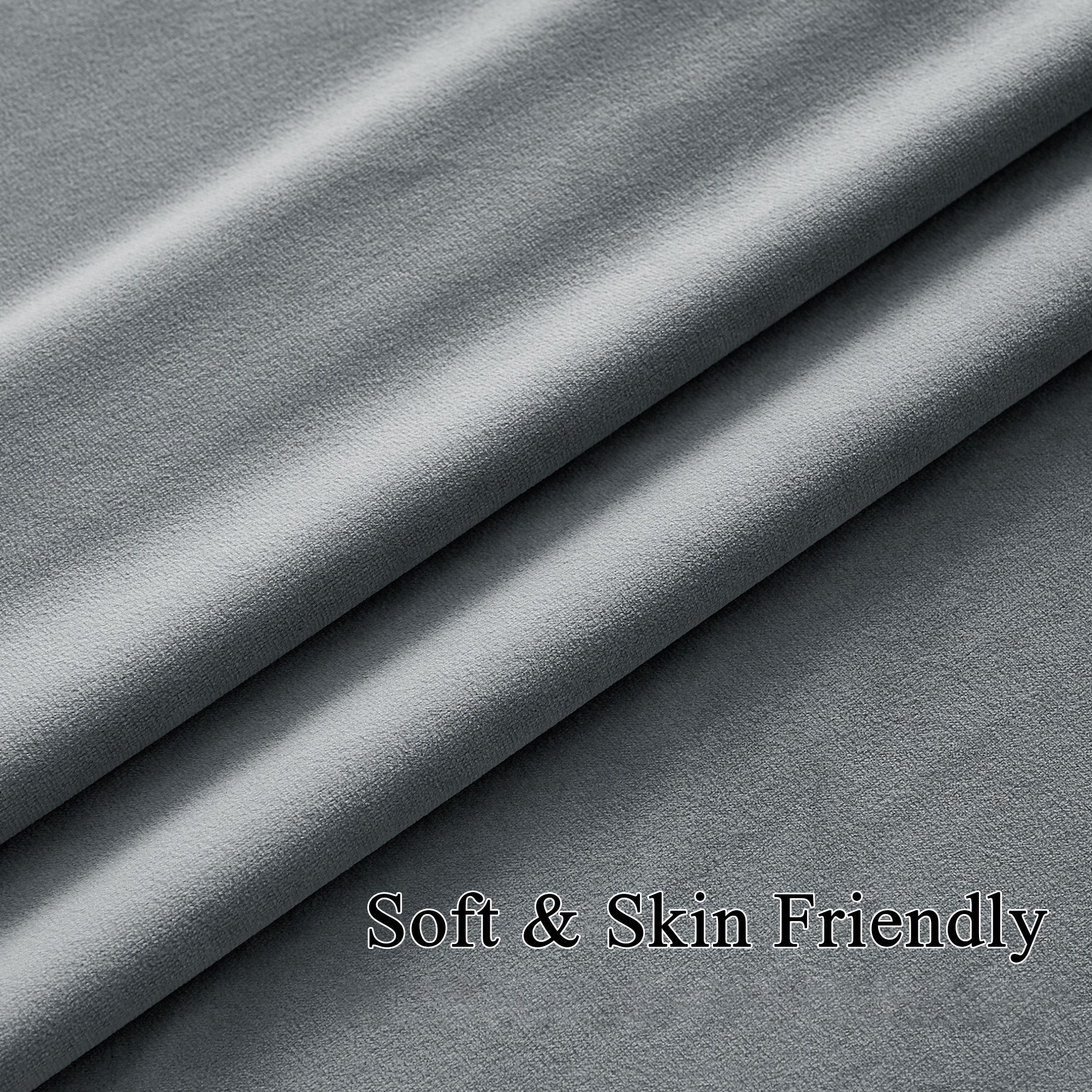Soft grey velvet curtain fabric close-up, showing plush texture and elegant folds for thermal insulated light blocking drapes.