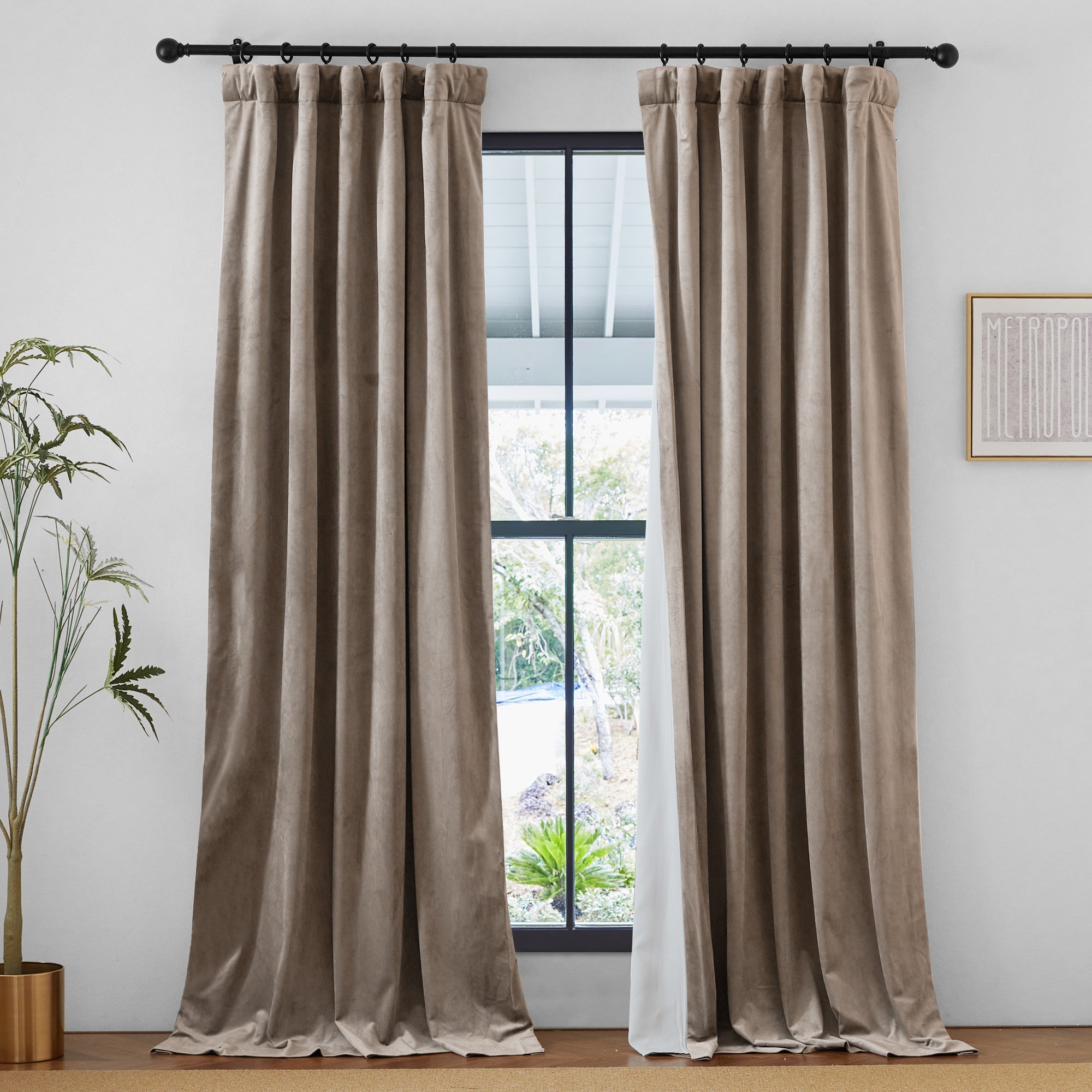 Taupe velvet 2-layer rod pocket & back tab thermal insulated light blocking thick drapes, partially open to an outdoor scene.