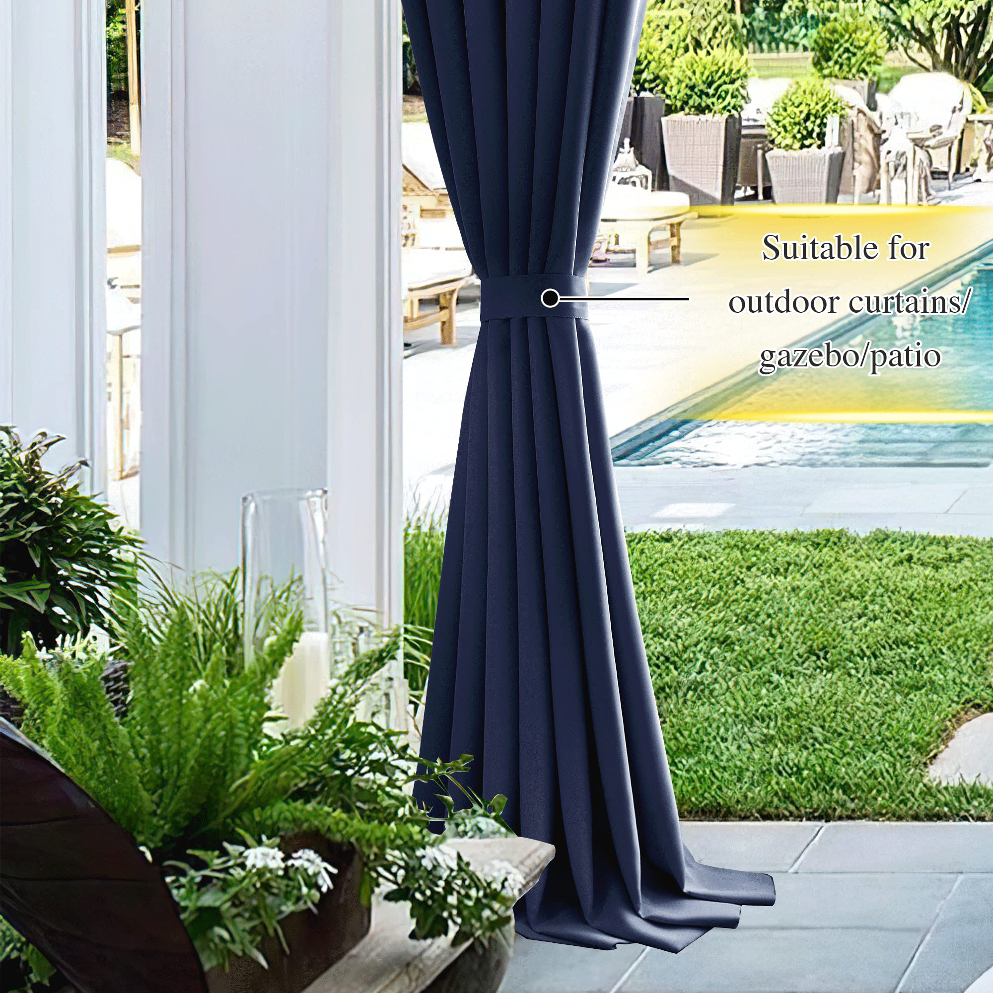 Navy blue outdoor curtain secured with a magnetic drape tie-back on a patio. Creates a shaded, private oasis by the pool.