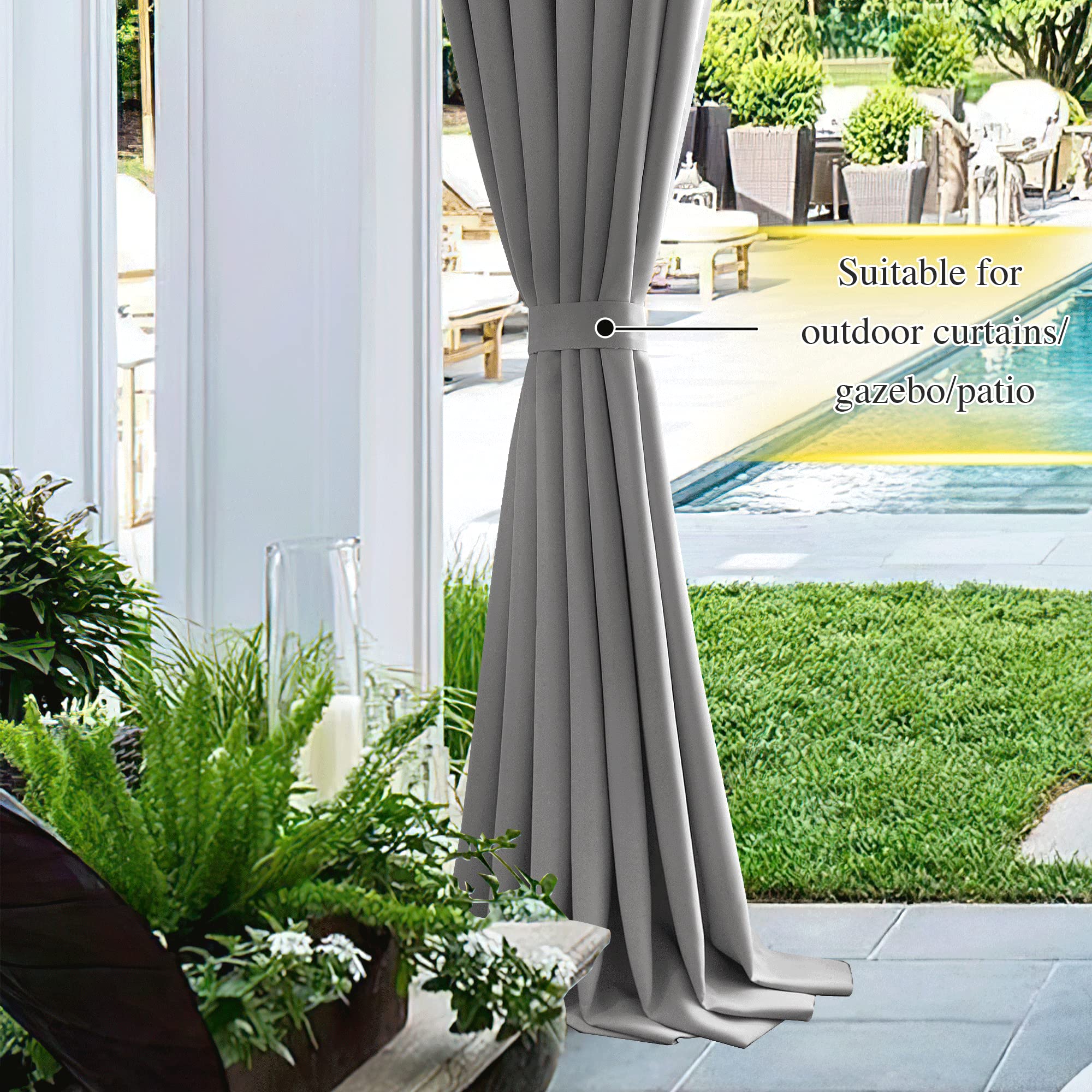 Gray outdoor curtain secured by a magnetic tie-back, providing elegant shade for a patio, pool, and outdoor living area.