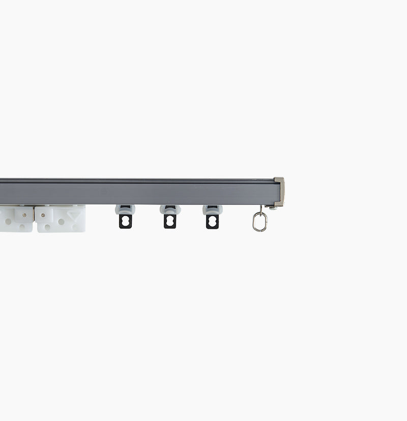 Heavy duty gray metal curtain track with carriers & end cap, designed for smooth magnetic closing outdoor curtains.