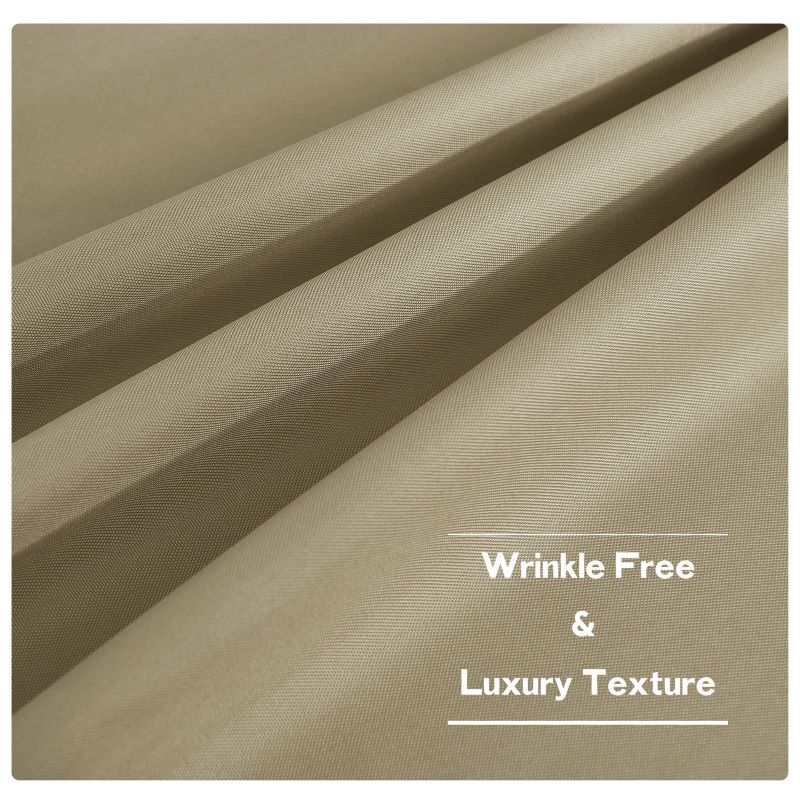 Close-up of khaki outdoor canvas curtain fabric with a wrinkle-free, luxury texture, highlighting its waterproof weave for patio use.