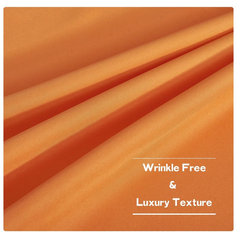 Close-up of orange waterproof outdoor canvas curtain fabric, showcasing its wrinkle-free, luxury texture and vibrant color.
