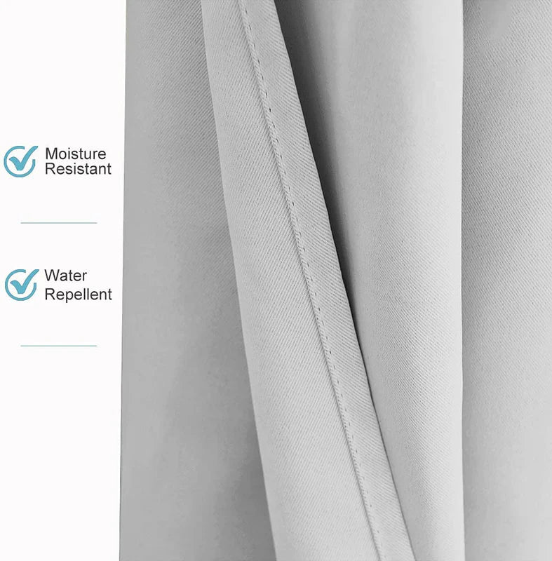 Detail of grey waterproof outdoor curtain fabric, highlighting its moisture-resistant and water-repellent features.