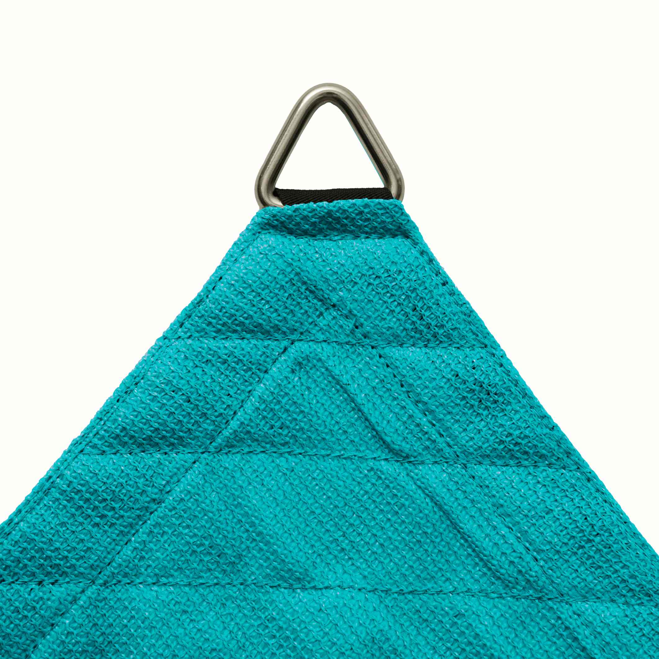Close-up of a teal HDPE breathable UV block sun shade sail corner with a heavy-duty triangular D-ring and reinforced stitching.