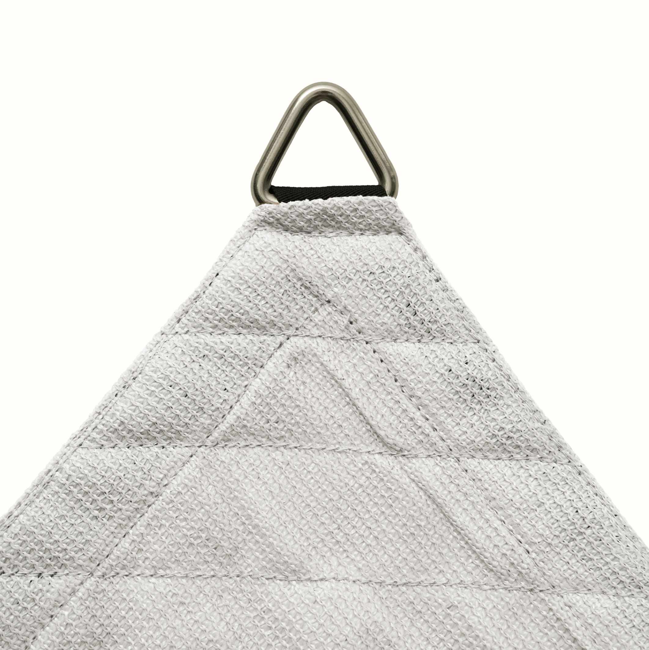 Close-up of a breathable light grey HDPE sun shade sail corner with a strong metal D-ring and reinforced seams for patio/pool.
