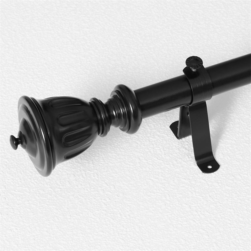 Close-up of a 1-inch black rust-resistant outdoor curtain rod with a decorative finial and mounting bracket.