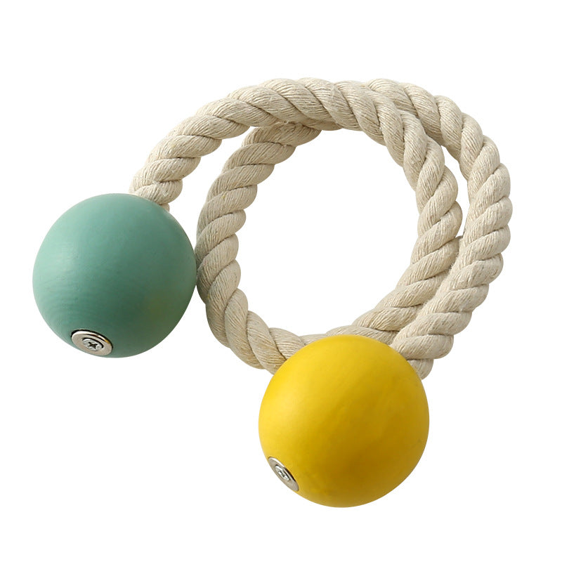 Hand-woven cotton rope magnetic curtain tieback featuring decorative teal and yellow ball holdbacks