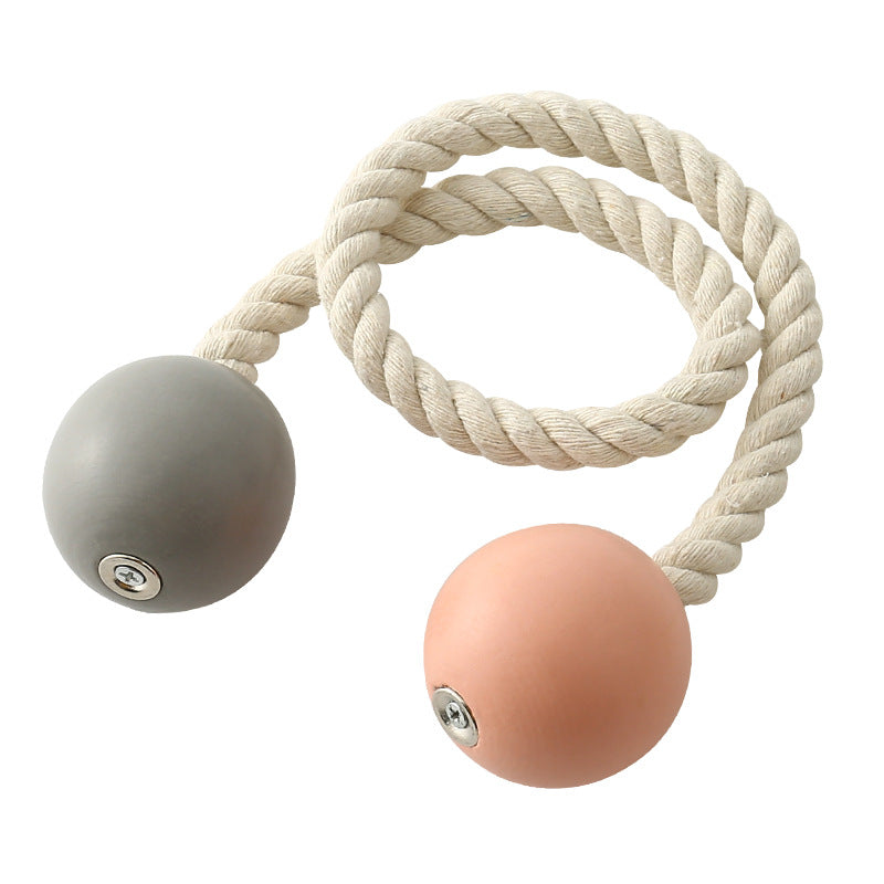 Decorative hand woven cotton rope curtain tieback with magnetic grey and peach spheres, ideal for outdoor curtains.
