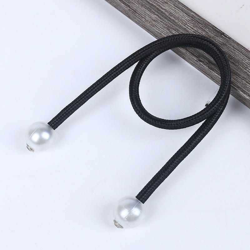 Black braided magnetic curtain tieback featuring translucent pearl balls on each end, perfect for outdoor shade curtains.