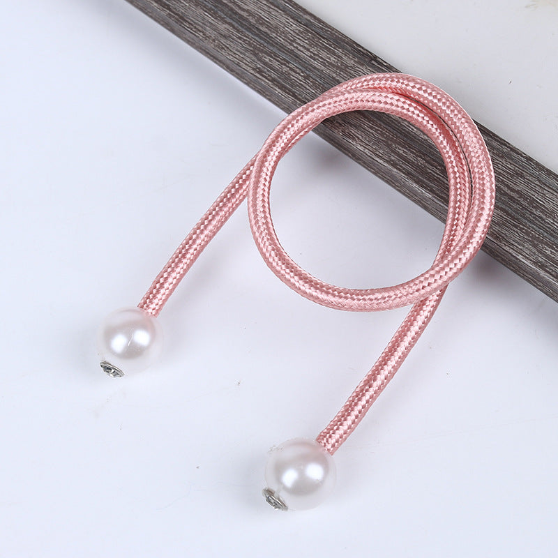 Elegant pink braided magnetic curtain tieback with two lustrous pearl balls, designed for stylish outdoor curtains and drapes.