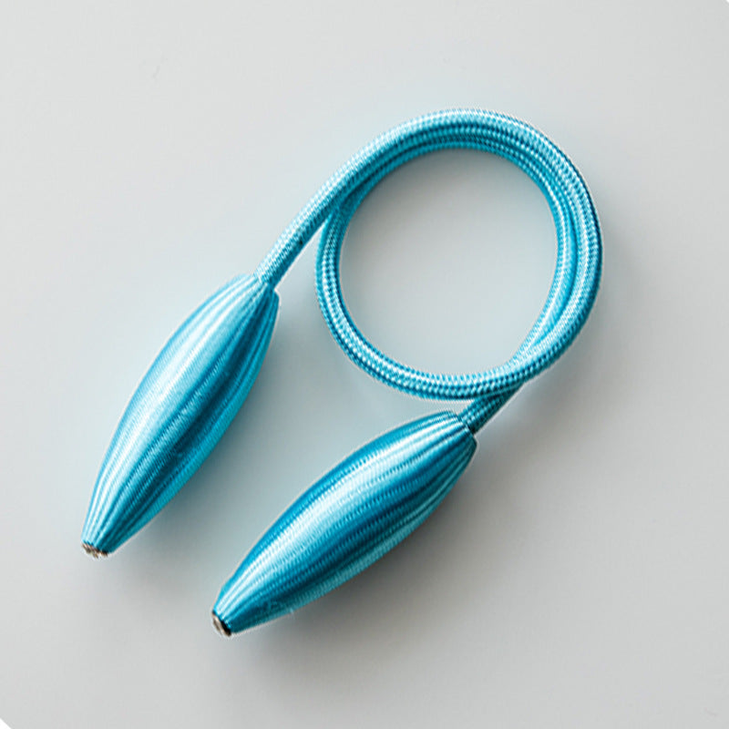 Single blue braided rope curtain tieback with modern teardrop buckle ends, coiled on a light background for stylish curtain decoration.
