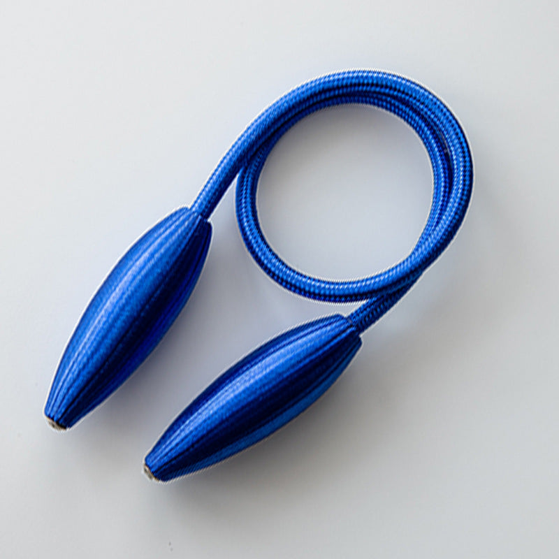 Blue modern curtain strap tieback with ribbed bullet ends, simple decorative buckle for outdoor patio curtains.