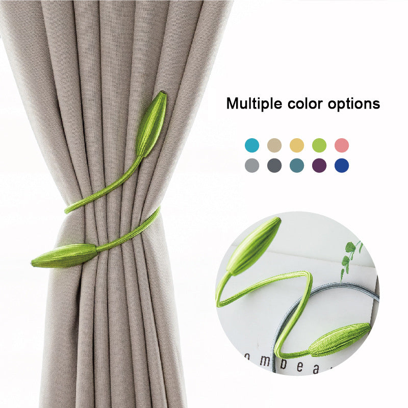 Modern green magnetic curtain tieback with decorative ends secures a beige curtain. Stylish buckle curtain strap, available in many colors.
