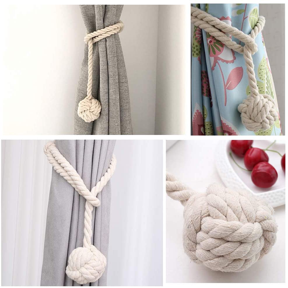Natural beige macrame curtain tiebacks feature decorative monkey knots, stylishly holding back gray and floral panel curtains.