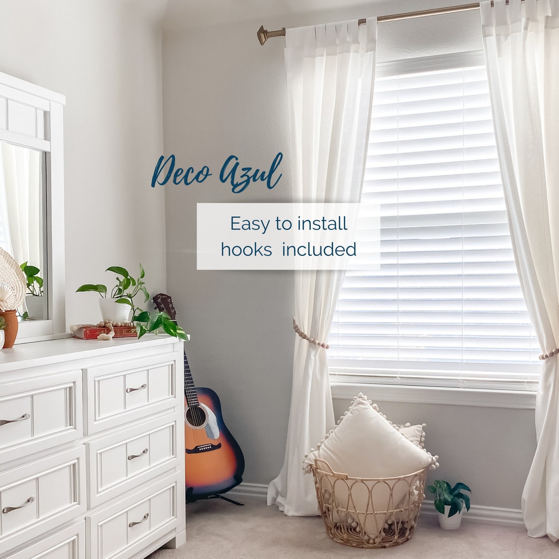 White window curtains elegantly held back by natural wooden bead curtain tiebacks, accentuating a stylish indoor living space.