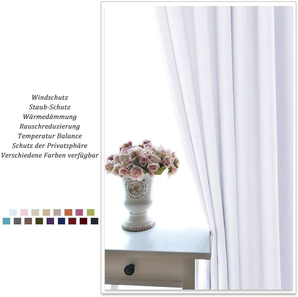 White grommet thermal insulated blackout weave curtain panel in a living room setting, with vase of pink flowers and color swatches.