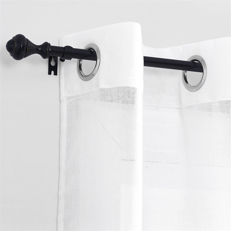 Close-up of a black adjustable outdoor curtain rod with an oval finial supporting a white decorative grommet-top outdoor curtain.