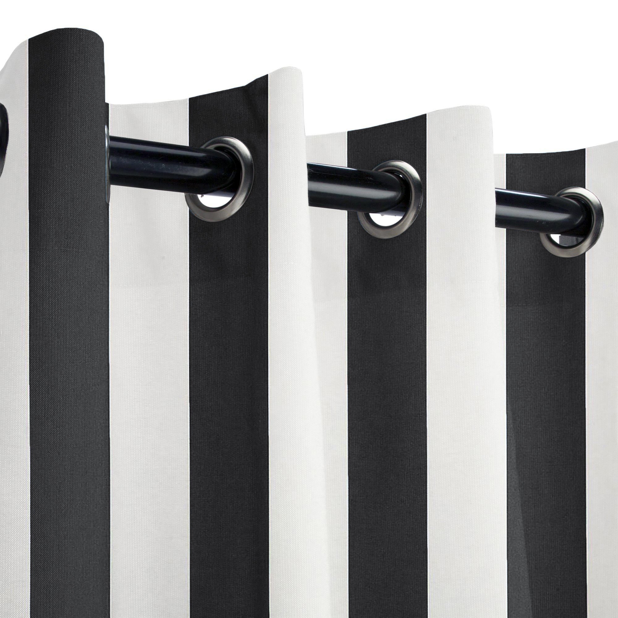 Close-up of KGORGE Fadenomore black and white striped outdoor curtain sample, heavyweight polyester fabric with metal grommets.