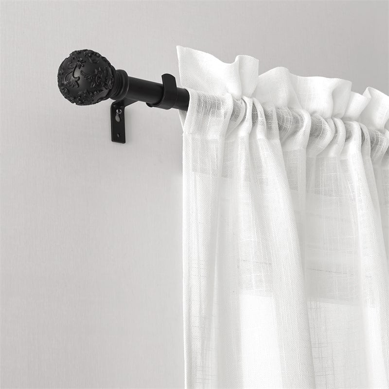Close-up of black adjustable outdoor curtain rod with decorative petal ball finial, holding a white textured curtain.
