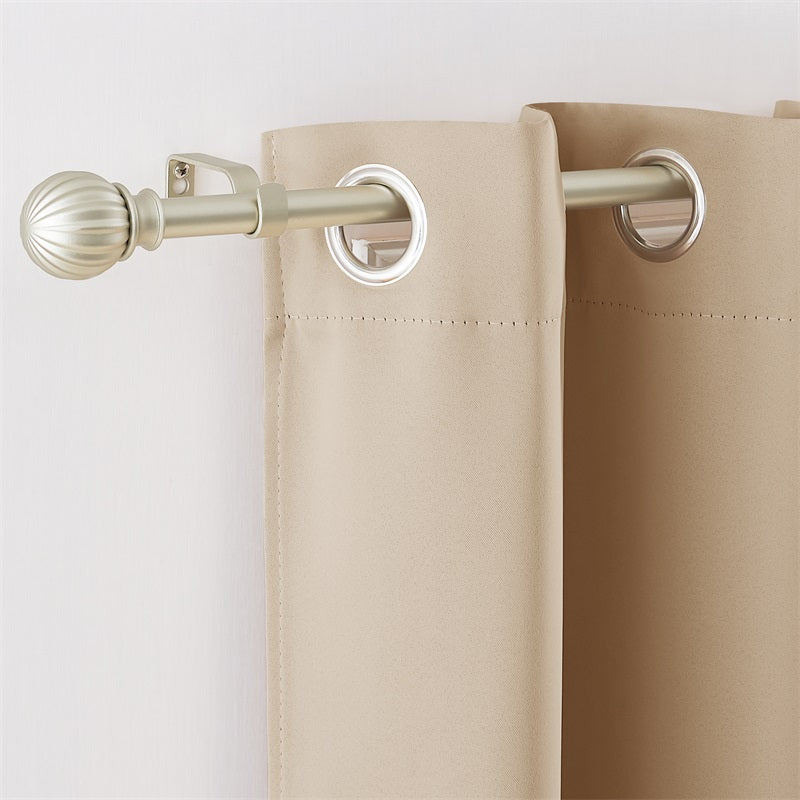 Champagne adjustable outdoor curtain rod with decorative petal ball cap finial holding a beige weatherproof grommet curtain.