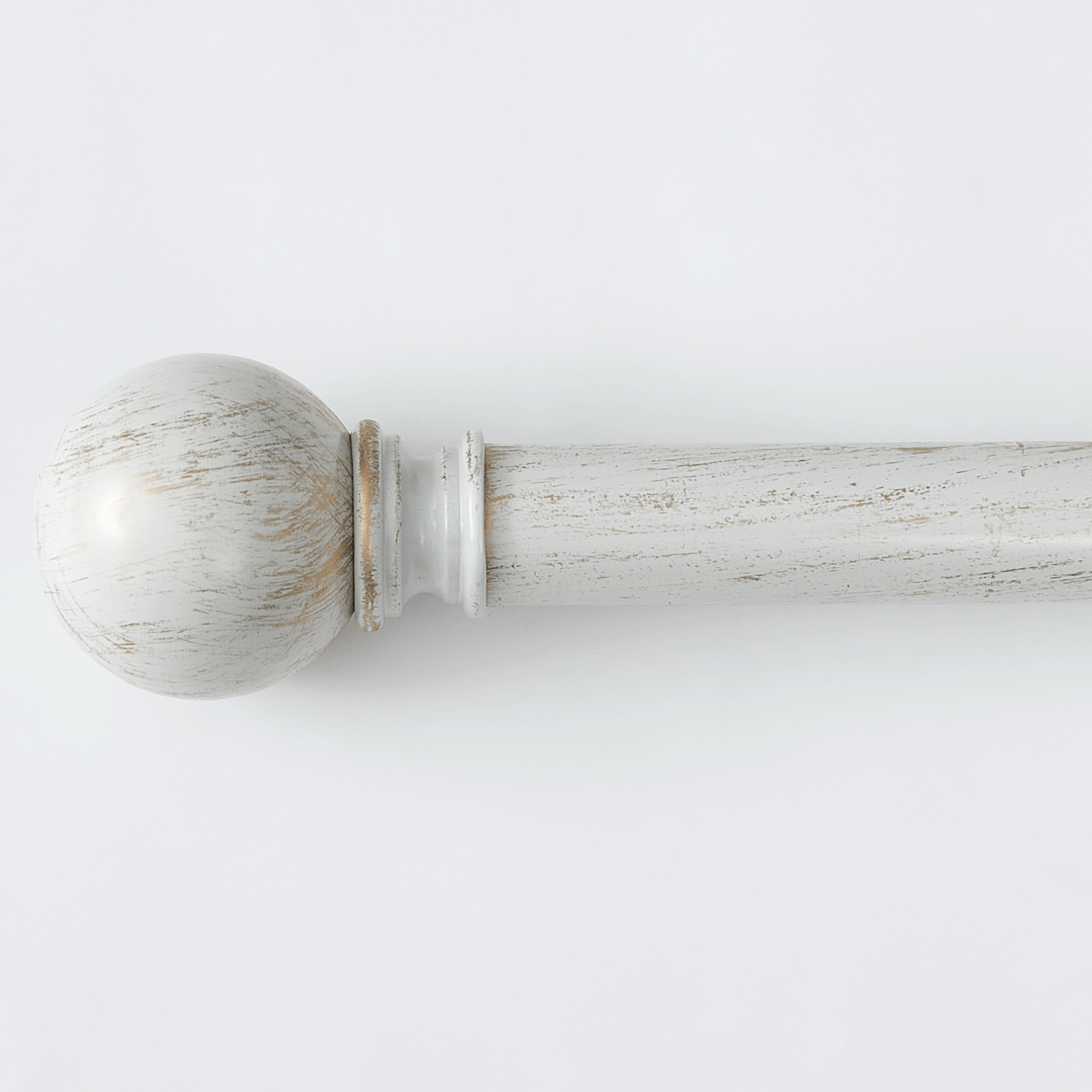 Antique white decorative curtain rod with a distressed finish and round ball finial, suitable for outdoor and indoor use.