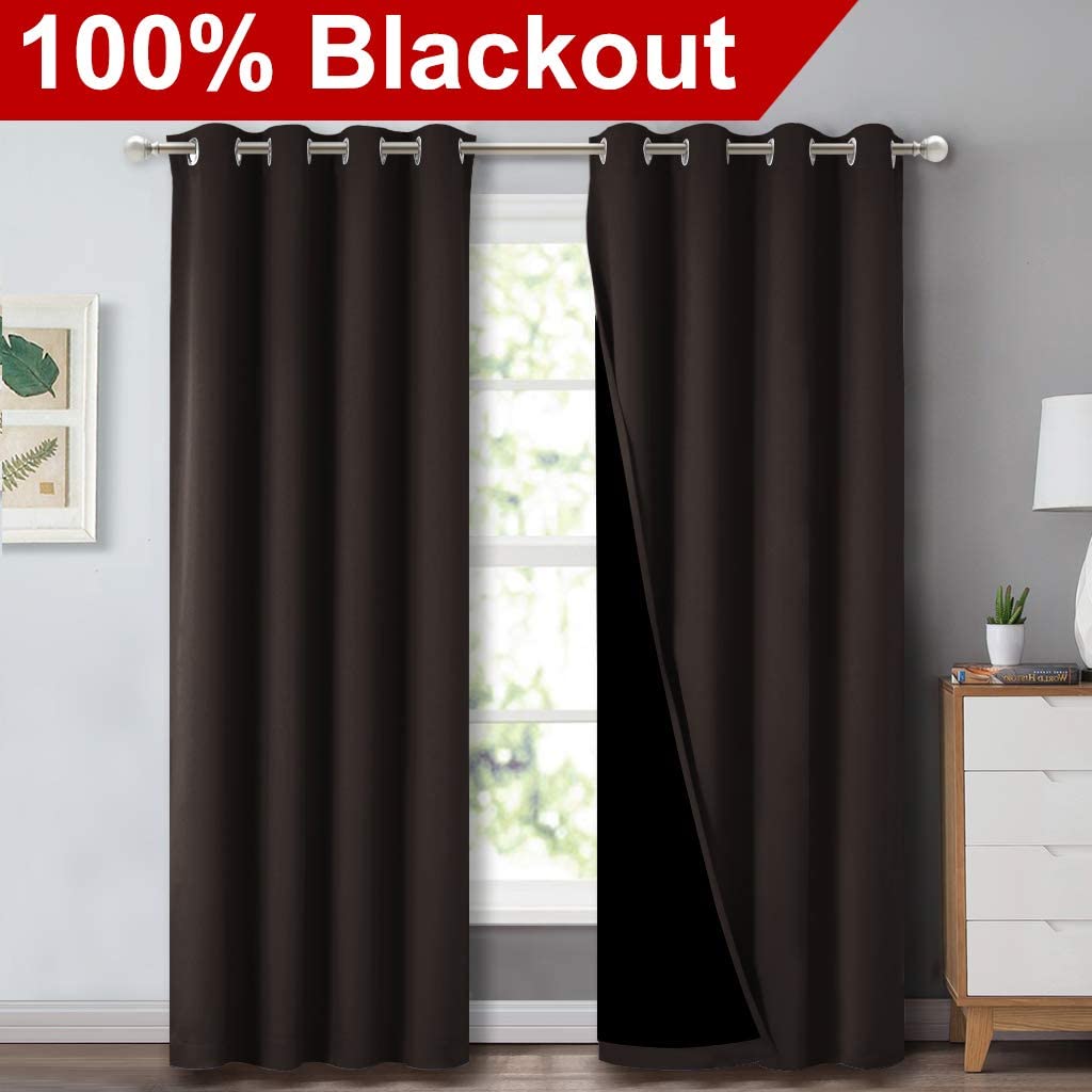 Dark brown double layer grommet blackout curtains (2 panels) for sliding glass door, one pulled back showing the 100% blackout lining.