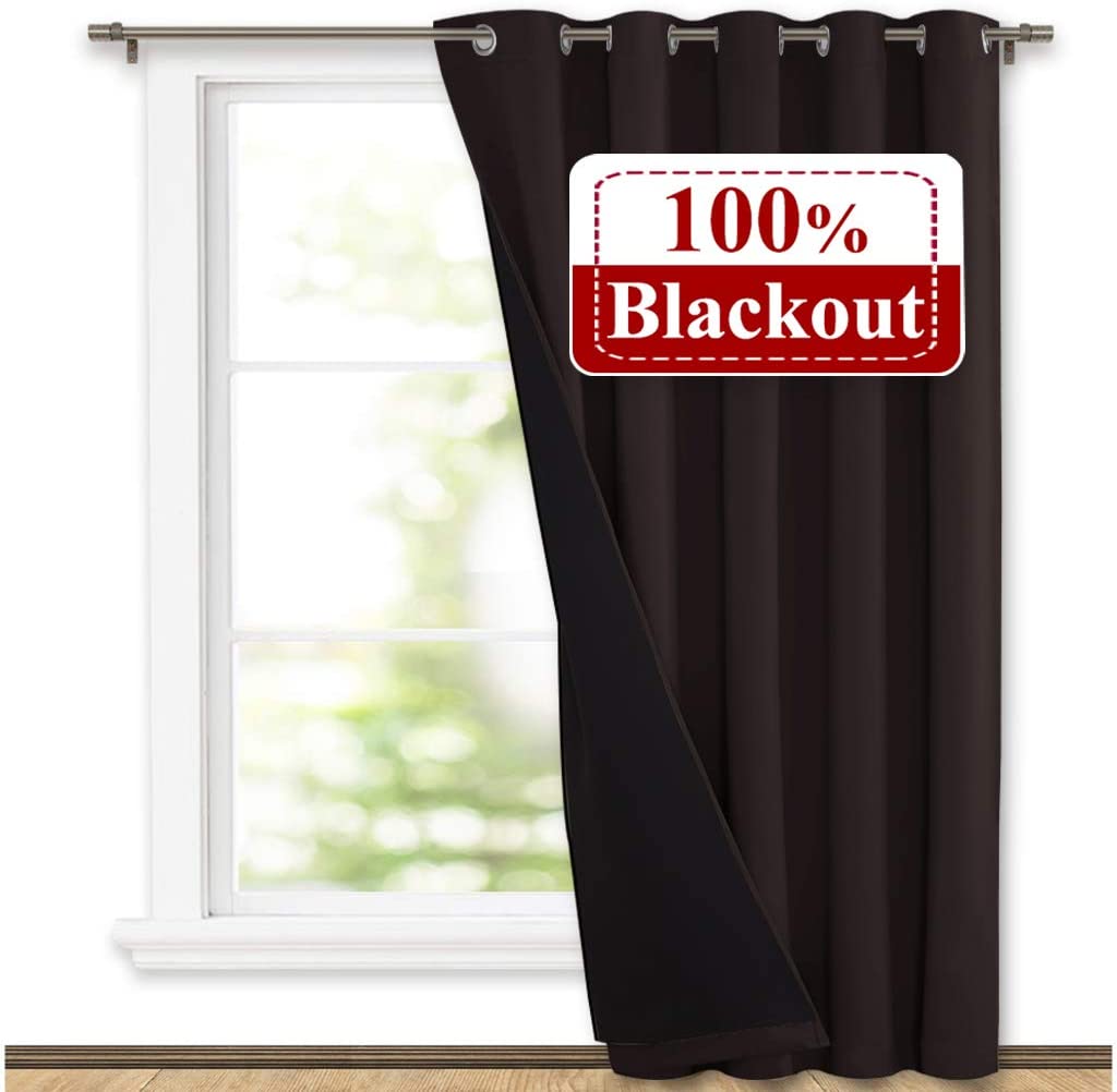 Dark brown double-layer grommet blackout curtain showing its light-blocking inner layer against a window for living room & bedroom.