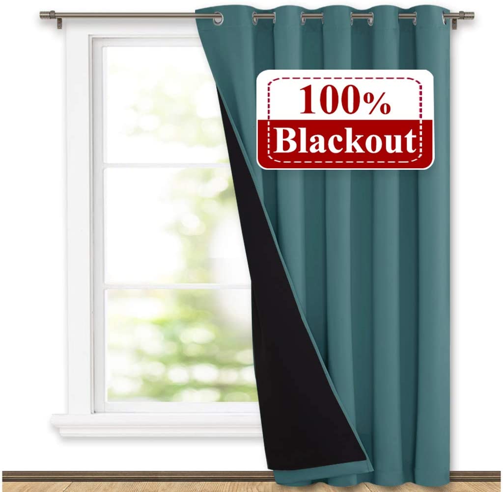 Teal double layer grommet blackout curtain, partially open to reveal black noise-reducing interior, perfect for living rooms or bedrooms.