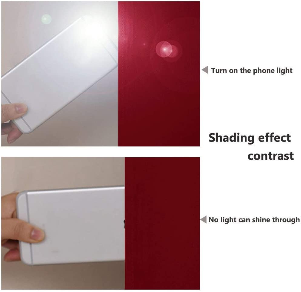 Demonstration of red double layer blackout curtain's effectiveness: Phone flashlight light fully blocked, ensuring complete room darkening.