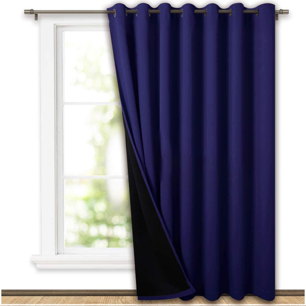 Navy blue double layer grommet thermal insulated blackout curtain panel with visible black lining, suitable for living room or bedroom.