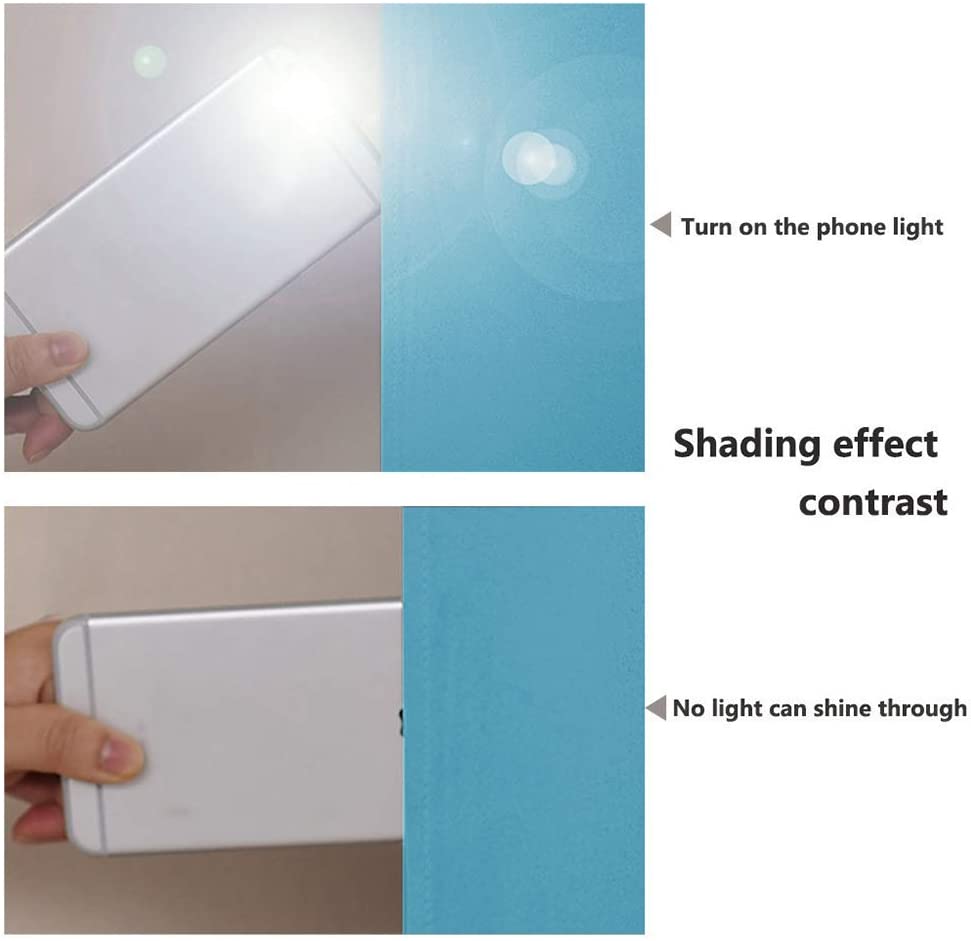Blackout curtain test: phone flashlight fails to penetrate double layer blue fabric, demonstrating complete light blocking.