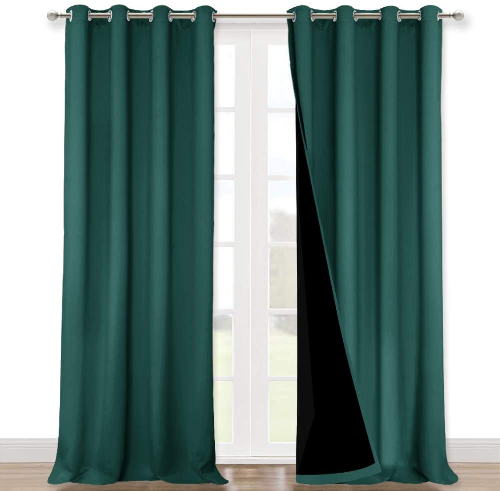 Dark green grommet blackout curtains, double-layer thermal insulated design with black backing visible, ideal for living room.