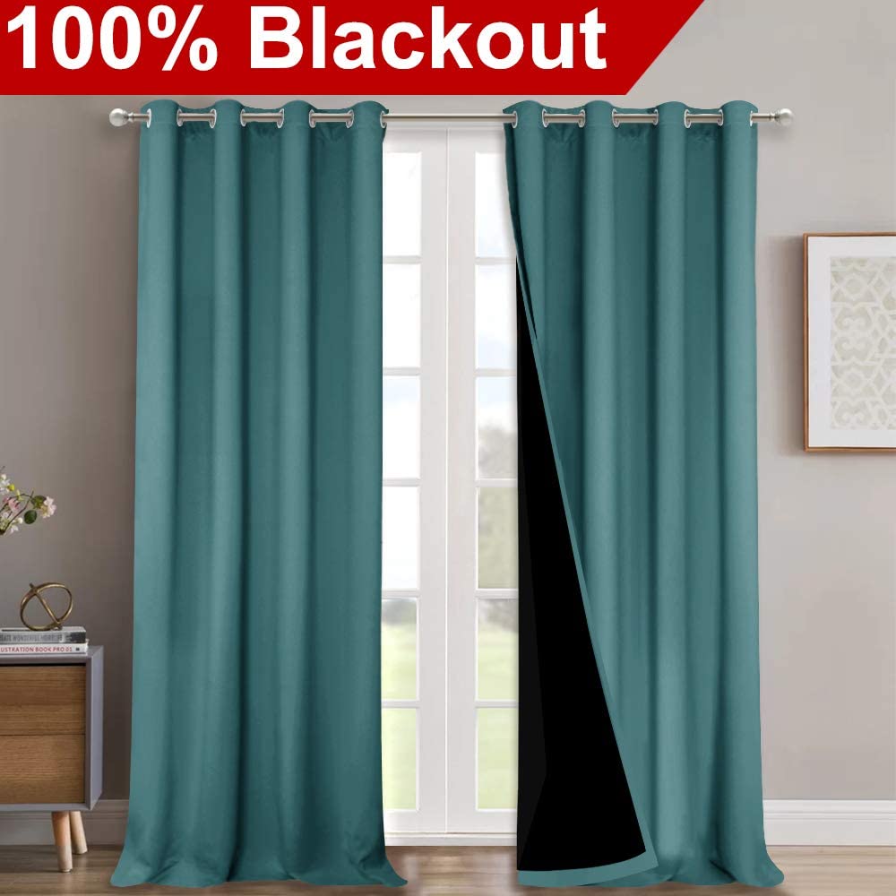 Teal double layer 100% blackout curtains with silver grommets for living room. Dark lining shows noise reducing feature.