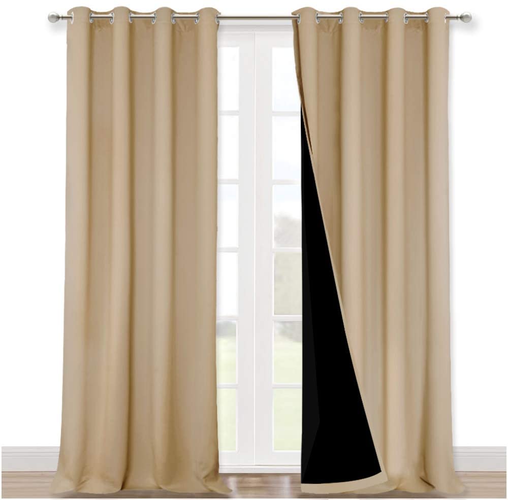 Beige double layer noise reducing curtains for living room, 2 panels with silver grommets, right panel open revealing black lining.