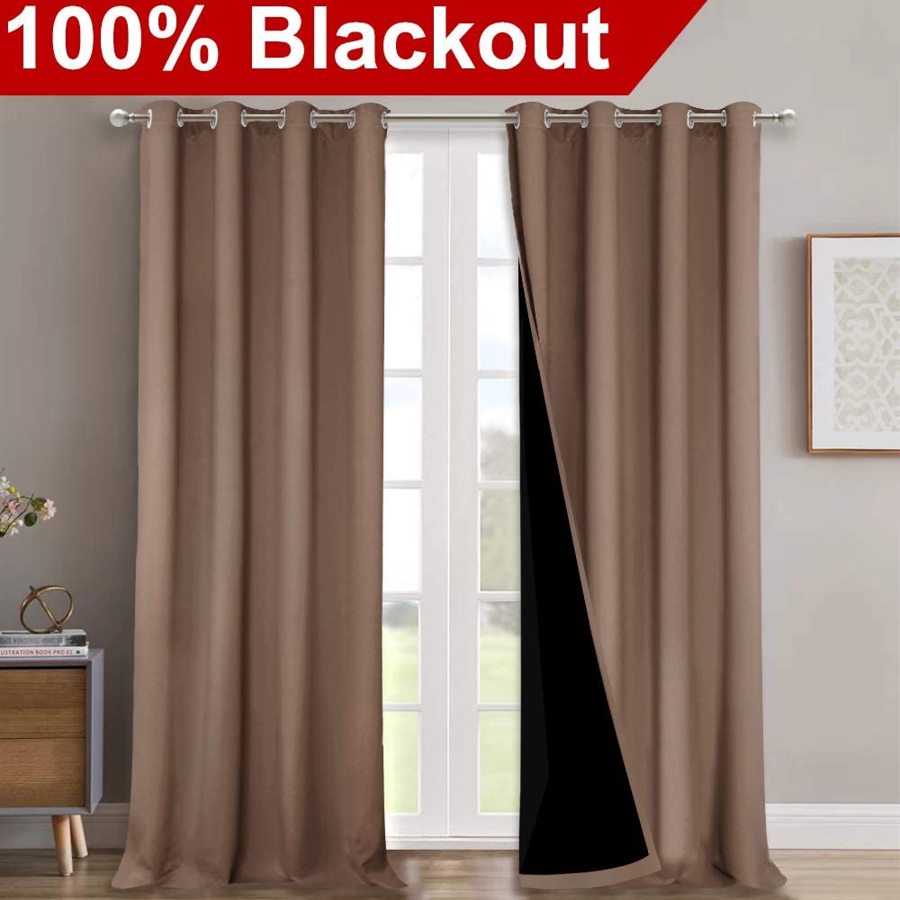 Two brown double layer noise reducing living room curtains with silver grommets. One panel is open, revealing the blackout lining.